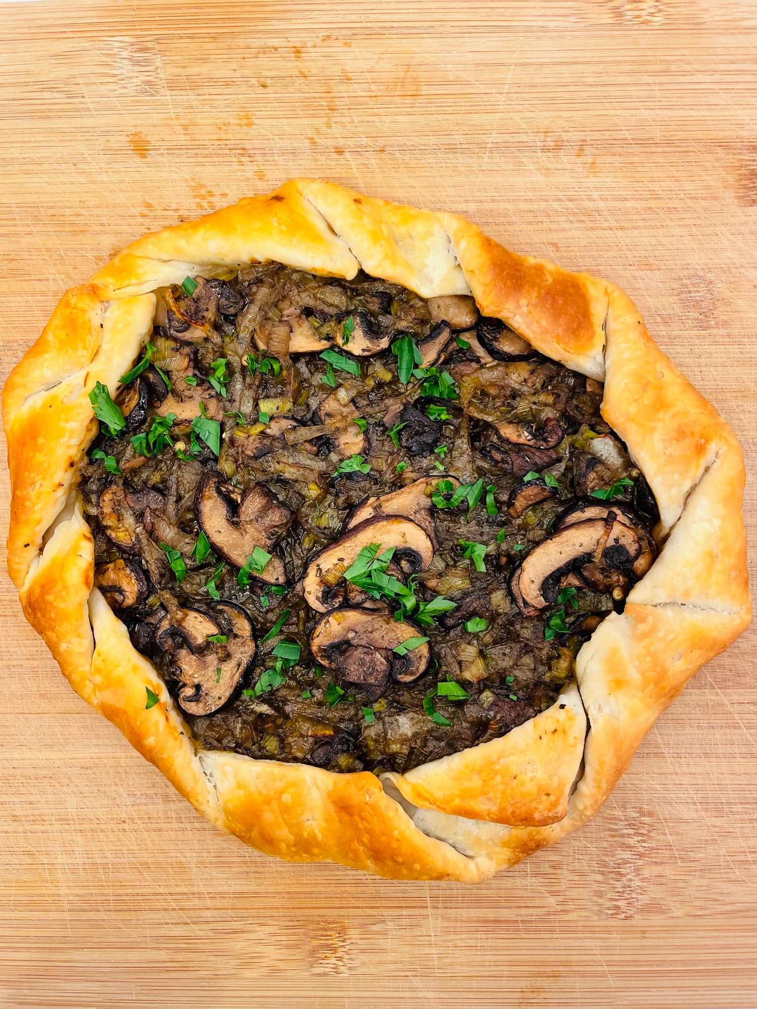Green Garlic, Onion, and Mushroom Galette Mimi Kozma